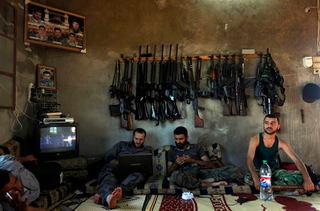 Illustration for article titled The 2013 Pulitzer Prize-Winning Images of the Syrian Civil War